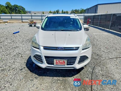 Piąte zdjęcie samochodu w środku: 2014 FORD ESCAPE TITANIUM VIN:1FMCU0J94EUE20287 - miniatura