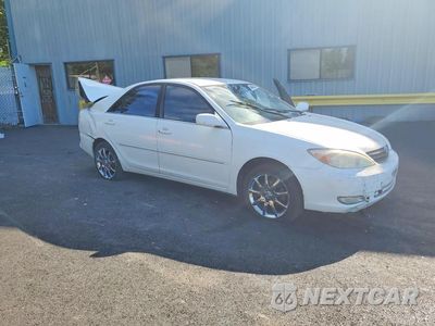 Czwarte zdjęcie samochodu z boku: 2003 TOYOTA CAMRY XLE VIN:JTDBE32K730239365 - miniatura