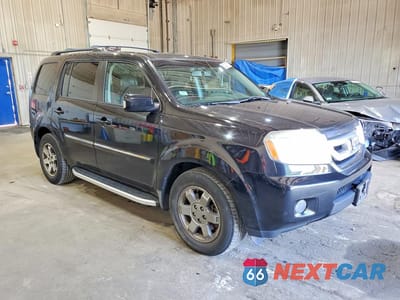 Czwarte zdjęcie samochodu z boku: 2011 HONDA PILOT TOURING VIN:5FNYF4H98BB028192 - miniatura
