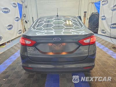 Zdjęcie 6 z 12 samochodu: 2016 FORD FUSION SE VIN:1FA6P0H71G5102112 - miniatura