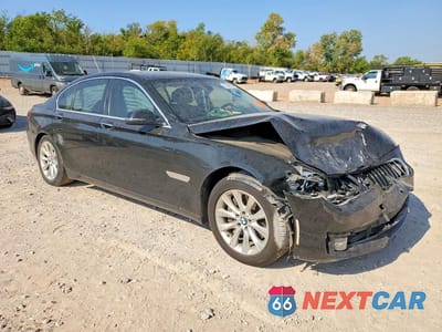 Czwarte zdjęcie samochodu z boku: 2014 BMW 740 I VIN:WBAYA6C59ED144430 - miniatura