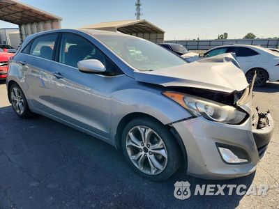 Czwarte zdjęcie samochodu z boku: 2013 HYUNDAI ELANTRA GT BASE VIN:KMHD35LE4DU121430 - miniatura