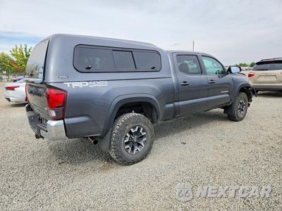 Trzecie zdjęcie samochodu z tyłu: 2018 TOYOTA TACOMA TRD OFF-ROAD VIN:3TMDZ5BN6JM050980 - miniatura