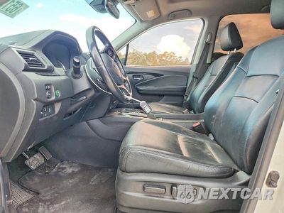 Zdjęcie 7 z 13 samochodu: 2019 HONDA PILOT TOURING VIN:5FNYF6H66KB036938 - miniatura
