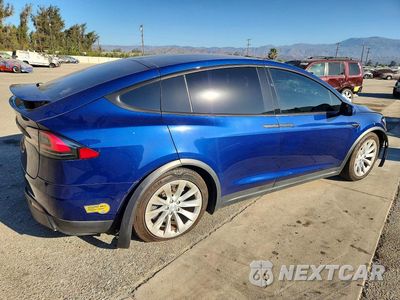 Trzecie zdjęcie samochodu z tyłu: 2018 TESLA MODEL X VIN:5YJXCDE27JF140492 - miniatura