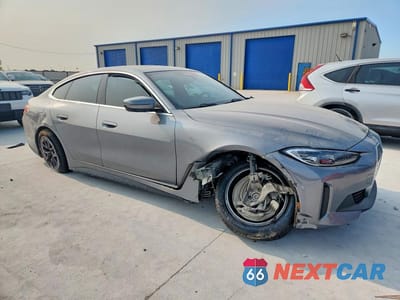 Czwarte zdjęcie samochodu z boku: 2024 BMW I4 EDRIVE 35 VIN:WBY43AW05RFR59926 - miniatura