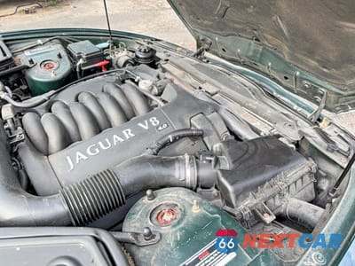 Zdjęcie 7 z 14 samochodu: 1999 JAGUAR XK8 VIN:SAJGX2049XC038524 - miniatura