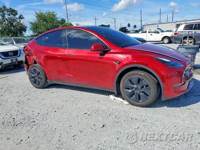 Czwarte zdjęcie samochodu z boku: 2024 TESLA MODEL Y VIN:7SAYGDED8RF087584 - miniatura