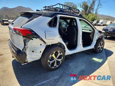 Trzecie zdjęcie samochodu z tyłu: 2023 TOYOTA RAV4 PRIME XSE VIN:JTMEB3FV7PD155328 - miniatura