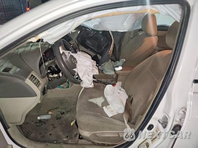 Zdjęcie 7 z 14 samochodu: 2010 TOYOTA COROLLA LE VIN:1NXBU4EE4AZ374433 - miniatura