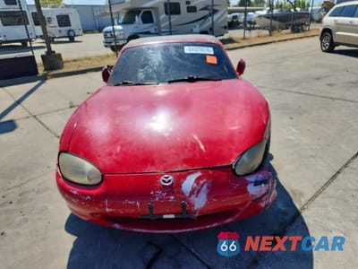 Piąte zdjęcie samochodu w środku: 1999 MAZDA MX-5 MIATA VIN:JM1NB3534X0116414 - miniatura