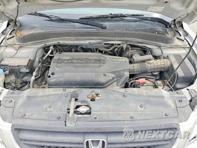 Zdjęcie 12 z 14 samochodu: 2004 HONDA PILOT EXL VIN:2HKYF18544H585133 - miniatura