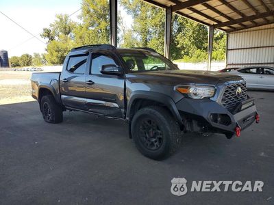 Czwarte zdjęcie samochodu z boku: 2022 TOYOTA TACOMA TRD OFF-ROAD VIN:3TYCZ5AN4NT079823 - miniatura