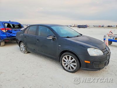 Czwarte zdjęcie samochodu z boku: 2010 VOLKSWAGEN JETTA VIN:3VWRA7AJ4AM024382 - miniatura