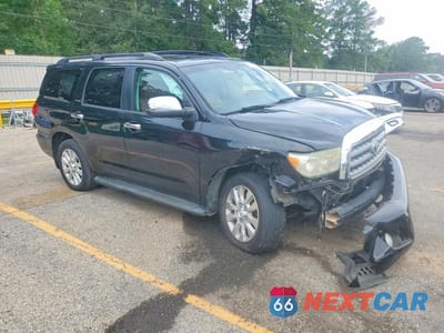 Czwarte zdjęcie samochodu z boku: 2014 TOYOTA SEQUOIA PLATINUM VIN:5TDYY5G17ES055329 - miniatura