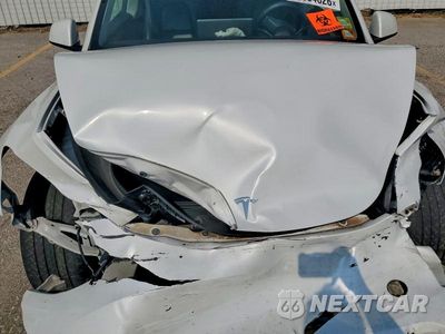 Zdjęcie 11 z 12 samochodu: 2023 TESLA MODEL Y VIN:7SAYGDEE6PA081804 - miniatura