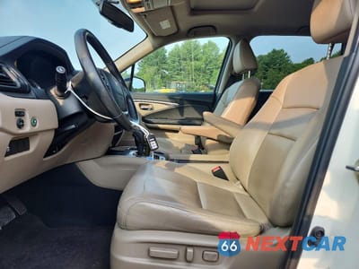 Zdjęcie 7 z 13 samochodu: 2016 HONDA PILOT EXLN VIN:5FNYF6H74GB065208 - miniatura