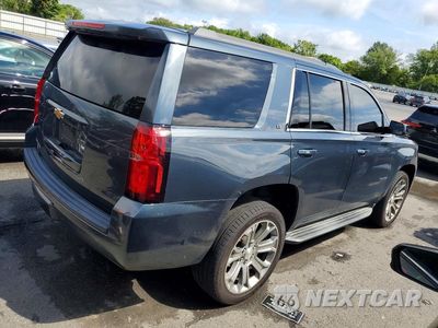 Trzecie zdjęcie samochodu z tyłu: 2019 CHEVROLET TAHOE K1500 LT VIN:1GNSKBKC4KR396512 - miniatura