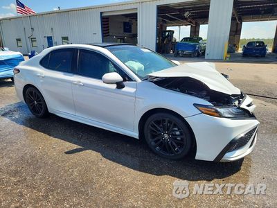 Czwarte zdjęcie samochodu z boku: 2023 TOYOTA CAMRY XSE VIN:4T1K61AK9PU744403 - miniatura