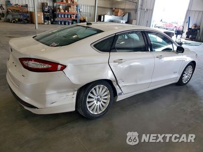 Trzecie zdjęcie samochodu z tyłu: 2016 FORD FUSION SE PHEV VIN:3FA6P0PU1GR280932 - miniatura