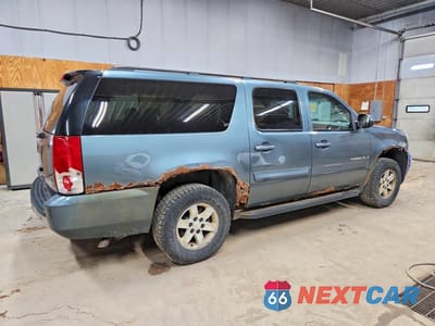 Trzecie zdjęcie samochodu z tyłu: 2009 GMC YUKON XL K1500 SLE VIN:1GKFK26349R205710 - miniatura