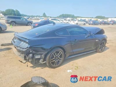 Trzecie zdjęcie samochodu z tyłu: 2021 FORD MUSTANG GT VIN:1FA6P8CF4M5123741 - miniatura