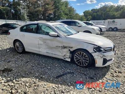 Czwarte zdjęcie samochodu z boku: 2021 BMW 540 XI VIN:WBA73BJ0XMWW95779 - miniatura