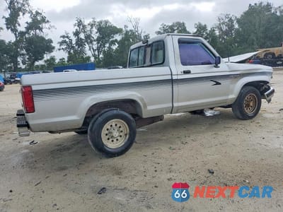 Trzecie zdjęcie samochodu z tyłu: 1992 FORD RANGER VIN:1FTCR10A7NUD24323 - miniatura