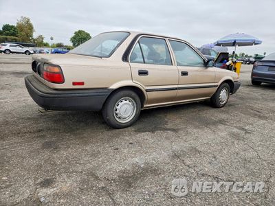 Trzecie zdjęcie samochodu z tyłu: 1989 TOYOTA COROLLA DELUXE VIN:JT2AE92E6K0156526 - miniatura