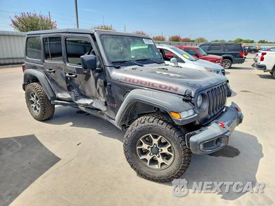 Czwarte zdjęcie samochodu z boku: 2022 JEEP WRANGLER UNLIMITED RUBICON VIN:1C4HJXFN9NW131556 - miniatura