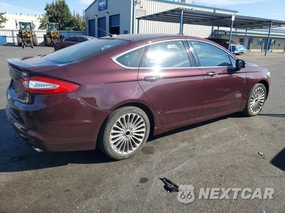 Trzecie zdjęcie samochodu z tyłu: 2013 FORD FUSION TITANIUM PHEV VIN:3FA6P0SUXDR242490 - miniatura