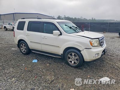 Czwarte zdjęcie samochodu z boku: 2011 HONDA PILOT TOURING VIN:5FNYF3H97BB052249 - miniatura