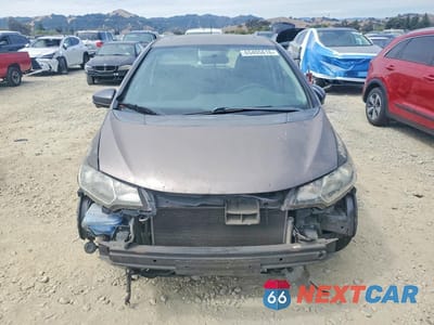 Piąte zdjęcie samochodu w środku: 2016 HONDA FIT EX VIN:JHMGK5H86GS016233 - miniatura