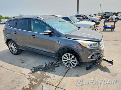 Czwarte zdjęcie samochodu z boku: 2018 FORD ESCAPE TITANIUM VIN:1FMCU9J9XJUB58306 - miniatura