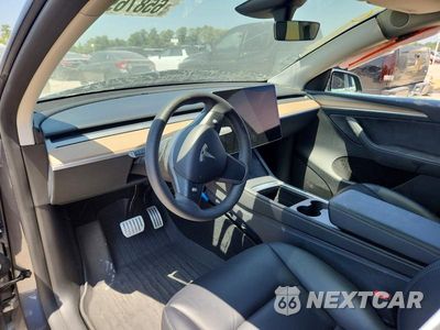 Zdjęcie 8 z 12 samochodu: 2023 TESLA MODEL Y VIN:7SAYGDEF7PF874976 - miniatura