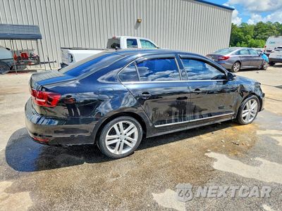Trzecie zdjęcie samochodu z tyłu: 2017 VOLKSWAGEN JETTA SEL VIN:3VWL17AJ0HM405369 - miniatura