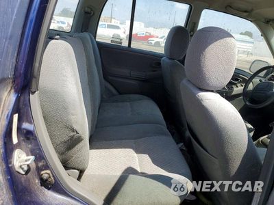 Zdjęcie 11 z 13 samochodu: 2000 CHEVROLET TRACKER VIN:2CNBE13C4Y6905118 - miniatura