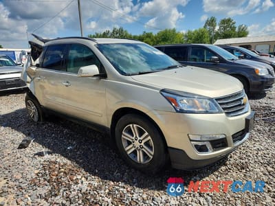 Czwarte zdjęcie samochodu z boku: 2016 CHEVROLET TRAVERSE LT VIN:1GNKRHKD0GJ305507 - miniatura