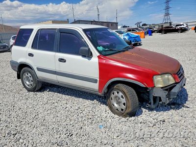 Czwarte zdjęcie samochodu z boku: 1999 HONDA CR-V LX VIN:JHLRD2849XC012397 - miniatura