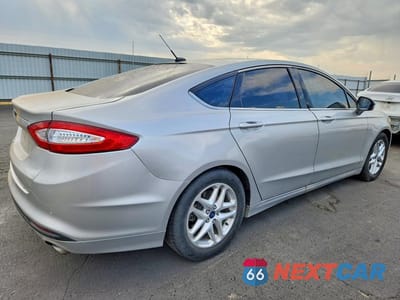 Trzecie zdjęcie samochodu z tyłu: 2016 FORD FUSION SE VIN:3FA6P0HD7GR187654 - miniatura