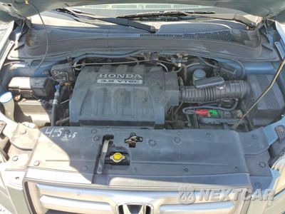 Zdjęcie 12 z 13 samochodu: 2006 HONDA PILOT EX VIN:2HKYF18456H516686 - miniatura