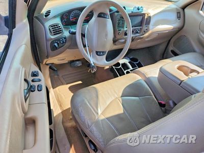 Zdjęcie 8 z 12 samochodu: 1999 FORD F150 VIN:1FTRX17L6XNC04033 - miniatura