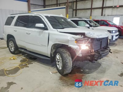 Czwarte zdjęcie samochodu z boku: 2018 CHEVROLET TAHOE K1500 LT VIN:1GNSKBKC1JR132324 - miniatura