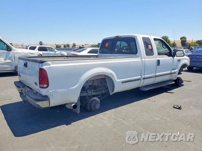 Trzecie zdjęcie samochodu z tyłu: 1999 FORD F250 SUPER DUTY VIN:1FTNX21F8XEC13467 - miniatura