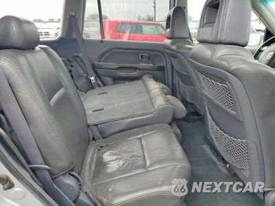 Zdjęcie 11 z 14 samochodu: 2004 HONDA PILOT EXL VIN:2HKYF18544H585133 - miniatura
