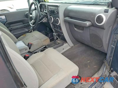 Zdjęcie 8 z 12 samochodu: 2008 JEEP WRANGLER SAHARA VIN:1J4FA54158L567140 - miniatura