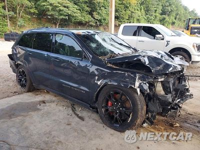 Czwarte zdjęcie samochodu z boku: 2017 JEEP GRAND CHEROKEE SRT-8 VIN:1C4RJFDJ1HC876404 - miniatura
