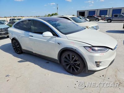 Czwarte zdjęcie samochodu z boku: 2017 TESLA MODEL X VIN:5YJXCBE2XHF054155 - miniatura