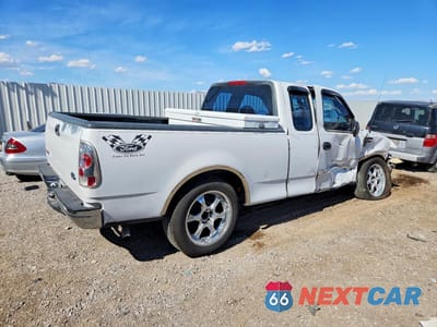 Trzecie zdjęcie samochodu z tyłu: 1999 FORD F150 VIN:1FTZX1726XKA12443 - miniatura