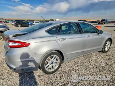 Trzecie zdjęcie samochodu z tyłu: 2016 FORD FUSION SE VIN:3FA6P0H7XGR158188 - miniatura